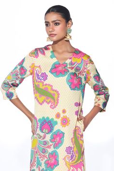 Cream kurta with multicolour floral and paisley printed motifs. Comes with matching pant. - Aza Fashions Festive V-neck Kurta With Block Print, Multicolor V-neck Blouse With Printed Motifs, Festive Multicolor V-neck Blouse Piece, Fitted V-neck Kurta For Navratri, Vibrant Print V-neck Tunic, Unstitched V-neck Blouse Piece For Spring, Festive Kalamkari Print V-neck Kurta, Bollywood Style V-neck Kurta With Printed Motifs, Fitted V-neck Kurta With Printed Motifs