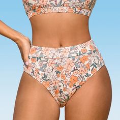 Embrace the beauty of nature with the Women's Peach Blossom High-Waisted Bikini Bottoms. Featuring a vibrant peach and cream floral print, these bikini bottoms are a true celebration of spring and summer. The high-waisted silhouette flatters your figure, providing a comfortable and flattering fit. Crafted from a lightweight and quick-drying fabric, these bottoms are perfect for beach days or poolside lounging. The full coverage design offers modest yet stylish coverage, allowing you to feel conf High Waisted Full Coverage Bathing Suits, Beachy Swimwear With Floral Print And Stretch, Beachy Stretch Swimwear With Floral Print, Stretch Floral Print Swimwear For Beach Season, Casual Summer Swimwear Briefs, Casual Brief Swimwear For Summer, Beachwear Tankini For Beach Season, Summer Brief Swimwear For Beach Season, Beach Party Brief Bottoms For Summer