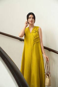 Made from high-quality linen, this dress features a loose, flowy silhouette and a flattering V-neckline. Perfect for any occasion, this dress is a must-have for those hot summer days.   *The picture is only for reference, the length of the real product will be different. Silk Midi Dress, Yellow Mustard, Be Different, Designer Collection, Mustard Yellow, Silk Fabric, Hot Summer, Summer Days, Online Fashion