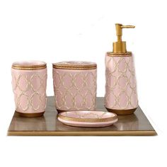 pink and gold bathroom accessories set with soap dispenser