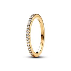 Choose delicate sparkle when you wear the Sparkling Band Ring. An essential piece for every collection, this 14k gold-plated ring is set with a row of clear cubic zirconia. The pav� row sparkles from the outer front half of the band, which features a squared profile. Peek inside the band to see the engraved iconic Pandora logo. Whether you wear it solo for subtle sparkle or stack it with other styles, this shining ring will elevate your everyday. Pandora Logo, Pandora Gold, Timeless Ring, Ringe Gold, Pandora Rings, Gold Band Ring, Ring Size Guide, Pandora Jewelry, Christmas Wishlist