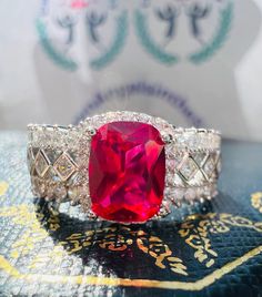 Vintage Style Red Ruby Channel Setting Ring Exquisite Jewelry Vintage style ART DECO design Ring S925/14K/18K Gold ♥5 days ready to ship ♥ The main stone is the Finest Lab-Grown Ruby/Sapphire. ♥Absolutely gorgeous and beautifully handcrafted Finest Lab-Grown Ruby/Sapphire in an exquisite setting. ♥ This classic yet trendy Jewelry makes the perfect Christmas/Anniversary/Valentine's/Birthday gift for her that will be treasured forever. We have confidence that the beautiful and sparkling piece will get her deeply moved and joyful with tears! ♥ This is the perfect conflict-free alternative to a mined Ruby/Sapphire! ♥ We use the finest Finest Lab-Grown Ruby/Sapphire in the market. They are hand-cut and faceted to the highest quality standards to make sure you get a wonderful piece with maximum Luxury Red Ruby Ring With Gemstone Accents, Luxury Red Ruby Gemstone Ring, Luxury Hallmarked Red Jewelry, Luxury Red Hallmarked Jewelry, Exquisite Red Jewelry With Gemstone Accents, Luxury Ruby Ring With Diamond Cut For Gift, Luxury Ruby Ring With Diamond Cut As Gift, Dazzling Ruby Ring As A Gift, Dazzling Ruby Ring Perfect For Gift