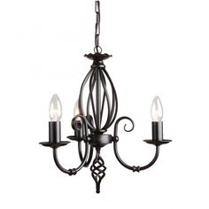 an iron chandelier with three lights hanging from the front and back ends, on a white background