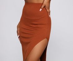 Stretch Maxi Skirt With Side Slits, Chic Ribbed Long Skirt, Chic Long Ribbed Skirt, Chic Ribbed Midi-length Bottoms, Chic Ribbed Midi Length Bottoms, Chic Stretch Maxi Skirt With Split, Asymmetrical Skirt With Side Slits And Stretch, Chic Ribbed Maxi Skirt For Spring, Stretch Bottoms With Side Slits And Asymmetrical Skirt