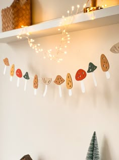 there are many cookies hanging on the wall