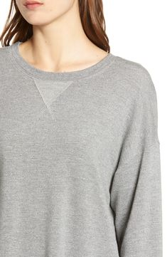 A versatile staple, this sporty pullover is made in a luxe blend of supersoft fibers and has a heathered finish that goes with everything. Crewneck Long sleeves 62% rayon, 30% cotton, 5% spandex, 3% polyester Machine wash, tumble dry Imported t.b.d. Gray Relaxed Fit Athleisure Sweater, Heather Grey Relaxed Fit Sweatshirt Athleisure, Sporty Heather Grey Sweater With Ribbed Cuffs, Heather Grey Crew Neck Sweats For Loungewear, Comfy Cotton Soft Knit Tops, Comfy Soft Knit Cotton Tops, Heather Grey Athleisure Top With Ribbed Cuffs, Gray French Terry Tops With Ribbed Cuffs, Heather Grey Sporty Tops For Loungewear