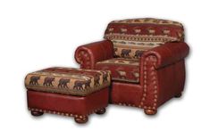 a red leather chair with an ottoman and footstool in the shape of a bear