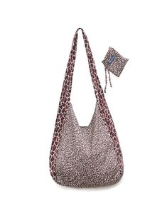 Fierce and feminine, this slouchy tote bag features a chic twin animal print and super-soft durable fabric perfect for carrying your on-the-go essentials. When not in use, easily roll up and store in its matching compact bag (included). Animal print tote bag Slouchy silhouette Made from super-soft fabric Compact storage bag included Style# BGIFTBAG21 Slouchy Tote Bag, Slouchy Tote, Animal Print Tote Bags, Compact Bag, Walk On The Wild Side, Take A Walk, Wallet Pouch, Compact Storage, Printed Bags