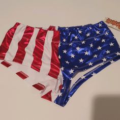 Red White And Blue Patriotic Hot Pants Shorts Perfect For Wonder Woman Costume. Stretchy Shiny Lemon Fabric. Pre-Owned Tried On But Never Used, Tag Still Attached. Size Medium. Elastic Waistband. Wonder Woman Shorts, Lemon Fabric, Woman Shorts, Hot Pants Shorts, Woman Costume, Wonder Woman Costume, Women's Costumes, Pants Color, Red White And Blue