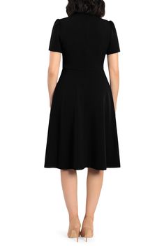 This dainty short sleeve dress is a retro inspired staple that's perfect for any well-dressed occasion. 45" length Necktie Short sleeves Back zip closure Lined 96% polyester, 4% spandex Hand wash, dry flat Imported Model Stats: 5'10" height; 34" bust; 27" waist; 35" hips. Formal Short Sleeve Midi Dress With Flattering Silhouette, Formal Midi Dress With Flattering Silhouette And Short Sleeves, Fitted Short Sleeve Midi Dress For Evening, Fitted Short Sleeve Mini Dress For Evening, Black Short Sleeve Dress With Flattering Silhouette, Black Short Sleeve Midi Dress For Work, Elegant Short Sleeve Midi Dress For Daywear, Classic Fitted A-line Short Sleeve Dress, Short Sleeve Midi Dress With Flattering Silhouette For Evening