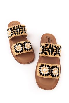 Hi. Hello. These sandals love long walks on the beach, summer shopping, + all things fun in the sun. The slip on style, backless design, + flat sole with open round toe is going to be your go to footwear from April to October. Thick toe straps adorned with a crocheted granny square inspired design in black + cream will match denim cutoffs, biker shorts, + flirty floral skirts. Effortless style is what I love + these slides are exactly that :) Lined footbed Made from Cotton + Rubber Cushioned Slip-on Slingback Sandals For Beach, Vacation Slip-on Slippers With Round Toe, Slip-on Round Toe Sandals For Beach, Slip-on Flat Flip Flops For Vacation, Bohemian Slip-on Sandals For Spring, Beach Slippers With Cushioned Footbed And Closed Toe, Adjustable Slip-on Slippers For Beach Season, Summer Slip-on Slingback Sandals For Vacation, Summer Beach Slip-on Slippers