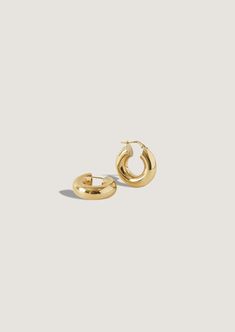 Overstated hoops dress up any look. Luxuriously weighted—but won't weigh you down.Style with a classic herringbone chain. 14k solid gold—always. Hollow Weight: 1.7g per earring Thickness: 6.5mm Total diameter: 23mm Hoop Care: Handle gently to prevent dents, as our hoops are delicate and cannot be easily repaired. Minimalist 14k Gold Hoop Earrings For Formal Occasions, Minimalist 14k Gold Hoop Earrings For Formal Events, Formal Minimalist 14k Gold Hoop Earrings, 14k Gold Tarnish-resistant Hoop Earrings For Formal Occasions, Timeless 14k Gold Tarnish Resistant Hoop Earrings, Timeless Gold Plated Hoop Huggie Earrings, 14k Gold Filled Round Hoop Earrings For Formal Occasions, Formal 14k Gold Filled Round Hoop Earrings, Polished 14k Gold Filled Hoop Earrings