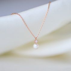 Tiny Diamond & Pearl necklace✨fresh water pearl and natural diamond setting pendant necklace.14K solid gold jewelry.* Detail *Material : 14k solid gold with fresh water pearl and genuine diamond.                  color : rose gold, gold or white gold * Size *Necklace length : 16.5 inches (If you want change chain length, please leave order note.)Pendant : 5*10 mmDiamond: Genuine 2mm brilliant cut diamond / VS Clarity / H color.Pearl : 4.5~5mm fresh water pearl.<If you want sterling silver with p Heart Solitaire Ring, Fresh Water Pearl Necklace, Pearl Necklace Gold, Water Pearl Necklace, Gold Mangalsutra Designs, Pearl And Diamond Necklace, Gold Mangalsutra, Baby Pearls, Necklace Diamond