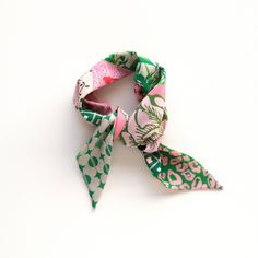 "This pink and green reversible triangular bandana is composed by Cinne in a patchwork of original prints. Throw it on for an effortlessly chic statement, giving any casual look a stylish twist. Style it around your neck, in your hair, or tied on your favorite bag.  They are constructed entirely by hand with love and attention to every detail. Find styling examples in the last photo. Ready to ship, ready to gift. color mix I've got all the best pinks and greens covered in this patchwork print wi Aka Gifts, Choker Scarf, Style Scarves, Triangle Bandana, Twist Style, Patchwork Print, Bandana Scarf, Chic Gifts, Color Mix