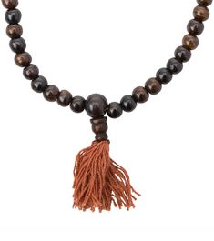 Malas are Tibetan rosaries, traditionally used for special Buddhist practice. Because Tibetan Buddhism suggests that there are 108 negative emotions to overcome, malas such as this Bone Counter Japa Mala are strung with 108 beads, one bead for each mantra. Features: Strung bone beads. Finished with a cotton tassel ends and bone beads. Use for meditation or spiritual practice. Details: Designed In: Nepal Material(s): Bone Dimensions: 28" Keywords: japa, japa mala, malas, rosary, bone, Nepal, medi Amulet Necklaces, Buddhist Practices, Tibetan Buddhism, 108 Bead, Bone Beads, Amber Jewelry, Negative Emotions, Mala Beads, Buddhism