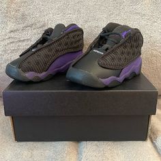 Jordan 13 Retro Baby Shoes. Black, Court Purple, White. Size 4c. Never Worn. Brand New! Purple Low-top Sneakers For Playtime, Black Synthetic Sneakers For Playtime, Purple Non-slip Synthetic Sneakers, Purple Lace-up Jordan Shoes, Baby Jordan Shoes, Jordan Purple, Baby Jordans, Jordan 13 Retro