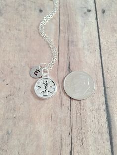 "This listing is for a hand stamped initial necklace featuring a 2/3\" x 1/2\" silver plated caduceus EMT charm & 3/10\" stainless steel initial pendant. The silver plated chain is 18\" long, but can be made to your desired length- see last photo in listing. Please indicate the chain length you would like in the 'notes to seller' section at checkout. All items are lead & nickel free. Message me with any questions, thank you! Add an initial to any necklace: https://www.etsy.com/listing/17 Everyday Silver Surgical Steel Jewelry, Nickel Free Adjustable Initial Pendant Jewelry, Adjustable Nickel Free Initial Pendant Jewelry, Adjustable Hypoallergenic Sterling Silver Charm Necklace, Personalized Stainless Steel Dangle Jewelry, Hypoallergenic Surgical Steel Round Jewelry, Adjustable Hypoallergenic Initial Pendant Jewelry, Adjustable Hypoallergenic Initial Pendant Charm Necklaces, Hypoallergenic Round Surgical Steel Jewelry