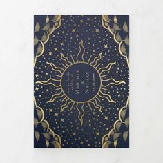 a card with the sun and stars on it in gold, black and blue colors