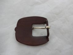 "A new 3 piece buckle set from Hansen Western Gear. The set is made of brown iron with sterling silver overlay bars with copper and brass accents. Pattern name is California. The measurements reflect the size of material that the buckle set will fit on to (the length measured from inner edge to inner edge). For example, the 5/8\" set will fit a 5/8\" wide piece of material." Formal Brown Belt Buckles With Silver Buckle, Vintage Brown Belt Buckles With Silver Buckle, Rectangular Antique Brown Belt Buckles, Vintage Brown Jewelry With Antique Buckle, Formal Brown Concho Belt Buckles, Adjustable Brown Jewelry With Antique Buckle, Western Horse Tack, Western Horse, Copper And Brass