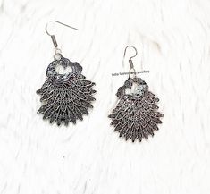 Beautiful Ethnic Handmade Peacock Oxidised Earrings. Traditional Earrings. Indian Jewellery. Ethnic Jewellery. Symbol of good luck Earrings. Anniversary Earrings. Dancing Peacock Earrings. Material - Brass/Copper. Silver Earrings With Peacock Design As A Gift, Silver Peacock Design Earrings As Gift, Bohemian Peacock Design Earrings For Party, Gift Silver Earrings With Peacock Design, Festive Silver Earrings With Peacock Design, Festive Ceremonial Earrings With Oxidized Finish, Silver Peacock Design Earrings For Party, Ornate Earrings With Oxidized Finish For Festivals, Elegant Silver Earrings With Peacock Design