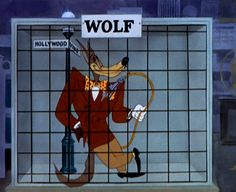 the wolf in the window is holding a cane and wearing a red suit with a bow tie