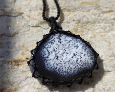 Beautiful handmade Macrame black and white Dendritic Agate pendant necklace (known as  Dendritic Opal or Merlinite) with an Adjustable black necklace cord. Dendritic Agate is known as the Stone of Plentitude. It is believed to bring abundance and fullness to all areas of life, encourage perseverance and patience, and promote a peaceful inner and outer environment. This necklace is a unique creation that will shine the uniqueness within you! It can be a great gift for your loved one or yourself. Macrame Black, Goddess Pendant, Agate Pendant Necklace, White Witch, Necklace Cord, Dendritic Opal, Witch Jewelry, Dendritic Agate, Handmade Macrame