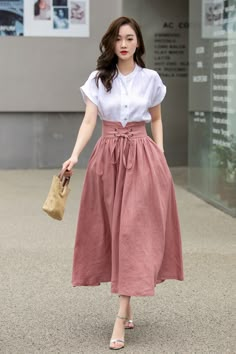 "DETAIL * 100% linen * No lining * Pleated around waist * Two side seam pockets * Front drawstring  skirt * Back zipper closure * Mid calf length * Perfect for spring and summer, autumn * Wash by hand or machine with cold water * The model is 170cm (5′7″) tall with a 80cm (31.5\") bust, 66cm (26\") waist. She is wearing the green skirt in size XS * Choose CUSTOM Order if you Can't find your size in our size Chart Chang the Length Your Height is not Between 5'1\" - 5\"9\" Your weight is not Between 45kg - 75kg Choose CUSTOM Order if you * Can't find your size in our size Chart * Change the Length * Change the sleeve length * Your Height is not Between 5'1\" - 5\"9\" * Your weight is not Between 47 kg - 75kg SIZE GUIDE Size vary between Brand and Country Please get your body measurement with Long Linen Skirt, Drawstring Skirt, Skirt Tulle, Rock Outfit, Linen Skirt, Pink Skirt, Green Skirt, Skirt Design, Skirts With Pockets