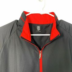 Elevate your casual wardrobe with the PGA Tour Golf Windbreaker, a perfect blend of style and functionality. This Mens Size L Black Red Golf Windbreaker Jacket features a sleek, solid black design with striking red accents, making it an eye-catching addition to your outdoor attire. Crafted from high-quality acrylic, this short sleeve windbreaker is designed to keep you comfortable during mild weather, whether you're hitting the golf course or enjoying a casual day out.PGA Tour Mens Size L Black Vintage Trucker Hats, Perfect Golf, Golf Jackets, Short Sleeve Jacket, Mens Windbreaker, Jacket For Men, Pga Tour, Red Accents, Golf Course