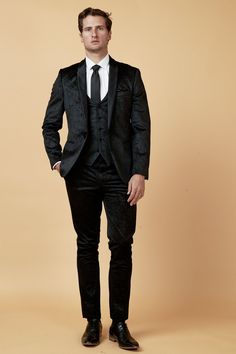 Make party wear easy with this Simon tuxedo style suit. Creating an elegant ensemble for all of those special events, this three piece is made to impress. It features a contrast satin shawl collar and embossed paisley design on the luxurious soft-to-the-touch velvet finish, a real showpiece. Model wears size 38R blazer, 38R waistcoat, 32R trousers. Features Slim fit Single-breasted Shawl lapel Single back vent Four button cuff Single button blazer fastening Waistcoat adjuster straps Complimentar Winter Semi-formal Three-piece Tuxedo Suit, Winter Semi-formal Tuxedo Three-piece Suit, Winter Tuxedo Three-piece Suit, Semi-formal Satin Suits With Notch Lapel, Fitted Tuxedo Style Satin Blazer, Satin Tuxedo With Notch Lapel, Fitted Satin Tuxedo With Notch Lapel, Fitted Satin Tuxedo Blazer, Satin Tuxedo With Notch Lapel For Formal Events