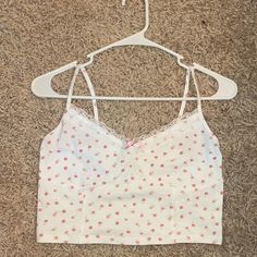 This Product Is From Pacsun. It’s A Medium, White, Cropped Tank Top With Pink Flowers. New With Tags! White Floral Print Cropped Crop Top, White Floral Print Crop Top, White Sleeveless Floral Print Crop Top, White Tank Camisole For Spring, White Fitted Summer Camisole, White Fitted Camisole For Summer, Cute Floral Print Crop Top For Summer, White Floral Print Camisole Tank Top, Spring Beach Cropped Camisole