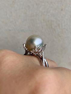 Excited to share this item from my #etsy shop: White south sea pearl ring grade. S925 sterling silver ring white gold plated. Seawater pearl. White pearl #southseapearl #seawaterpearl #indonesianpearl #australianpearl #naturalpearl #genuinepearl #sterlingsilver #pearlring Elegant Formal Pear-shaped Pearl Ring, Elegant Pear-shaped Pearl Ring For Formal Occasions, Exquisite White Gold Akoya Pearl Ring, Exquisite White Akoya Pearl Ring, Fine Jewelry Silver Pearl Ring, Elegant Pear Shaped Pearl Ring For Anniversary, Elegant Pear-shaped Pearl Ring For Anniversary, Silver Akoya Pearl Ring For Anniversary, Silver Akoya Pearl Ring In Fine Jewelry Style