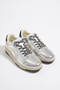 Silver leather cupsole sneaker Silver Low-top Sneakers With Metallic Logo, Modern Silver Sneakers With Metallic Logo, Metallic Leather Sneakers With Metallic Logo, Silver Lace-up Sneakers With Metallic Logo, White Sole Leather Sneakers With Metallic Logo, Silver Sneakers With Metallic Logo For Streetwear, Silver Leather Sneakers With Contrast Sole, Leather High-top Sneakers With Metallic Logo, Sporty Silver Sneakers With Contrast Sole