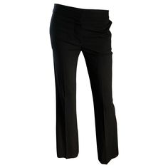 Classic and collectible for CHLOE black silk flared leg low rise trousers! Soft sturdy silk that holds shape nicely. Tailored fit, with a wider flare leg. Sits low on the hips, with button closure at waistband and zipper fly. Pockets at each side of the hips, and one pocket on the rear. Very flattering and versatile. The pictured Jean Paul Gaultier black crop top is also available in my 1stDibs Shop. Perfect for all year. In great unworn condition. Made in France Marked Size EU 36 / US 4 - 6 Mea 2000 Runway, Low Rise Y2k, Low Rise Trousers, Cape Designs, Y2k Pants, Classic Pants, Paul Gaultier, Jean Paul Gaultier, Trouser Pants