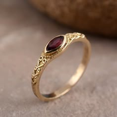 Red Garnet Ring, Beautiful Ring, Minimalist Ring, Garnet Jewelry, 18k Gold Ring, Dainty Ring, Gift For Her, Christmas Gift  I T E M D E S C R I P T I O N: Gemstone :Garnet All jewelry is Handmade and is Nickel/Lead FREE. so you don't have to worry about any allergies. C U S T O M E R S U P P O R T : We are available 24/7 to answer all your queries. We create all our products with utmost love and care. Still, if you find any flaws in it, please don't hesitate to contact us. Refunds and Replacements will be taken care of as per policy. P A C K A G I N G : The Rings come in a durable and reusable plastic box which is safe for children as well. (We request you to reuse). P R O C E S S I N G A N D S H I P P I N G : Top quality work takes time. it will take around 10 days to make the ring. Trans Garnet Ring Gold, Red Garnet Ring, Tiny Rings, Zierlicher Ring, Garnet Jewelry, Gold Filled Ring, Garnet Ring, 18k Gold Ring, Ring Minimalist