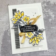 a close up of a card with flowers on it and the words celebrate written in black