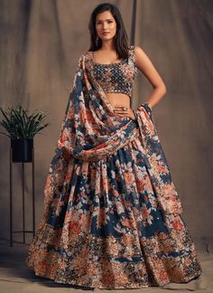 Be the belle of any wedding with our Premium Dove Blue Digital Printed Embroidered Organza Bridal Lehenga Choli. The intricate embroidery and luxurious organza fabric make this readymade Indian party chaniya choli a must-have for any wedding guest. Elevate your style and make a statement with this exclusive piece. The unstitched blouse can be customized upto 46 inches. Do Note: All the accessories shown are for styling purpose only. Slight color variation may occur due to photographic reasons. O Lehenga Choli Designs, Ghaghra Choli, Lehenga Choli For Women, Choli For Women, Floral Lehenga, Organza Lehenga, Lengha Choli, Organza Blouse, Blue Lehenga