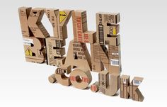 cardboard letters and numbers are stacked together