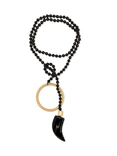 This striking 45-inch knotted necklace exudes a regal presence with a grand 18K Gold plated large ring at one end and a dazzling Agate Tooth-shape resembling a Tucan's beak at the other. Its endless style options allow it to be wrapped as little or as much as desired, creating unique and captivating looks. Elegant Agate Jewelry With Adjustable Chain, Elegant Hand Knotted Lariat Jewelry, Elegant Long Agate Necklace, Gift Onyx Single Strand Jewelry, Single Strand Onyx Jewelry Gift, Hand-strung Onyx Jewelry In Gold, Elegant Hand-strung Onyx Necklaces, Elegant Onyx Hand-strung Necklaces, Elegant Hand-strung Onyx Necklace