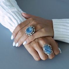 This chunky silver ring features a large kyanite stone with beaded boho details to add more interest. Every movement shows more detail of this magical gemstone. Gemstone - Kyanite 925 Sterling Silver Adjustable size Handmade in Taxco, Mexico Due to the uniqueness of gemstones, there may be slight variations in size, color or pattern Bohemian Agate Ring With Large Stone, Bohemian Rings With Natural Agate Stones, Bohemian Agate Rings With Natural Stones, Bohemian Sterling Silver Crystal Ring With Gemstone Accents, Bohemian Large Stone Moonstone Ring, Bohemian Agate Rings With Gemstones, Bohemian Agate Gemstone Ring, Handmade Bohemian Kyanite Jewelry, Bohemian Agate Rings