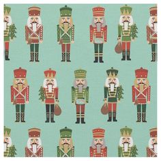 nutcrackers in green and red on a blue background