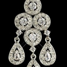 CZ%20Chandelier%20Earrings%0D%0AAdd%20a%20glamorous%20touch%20to%20your%20bridal%20or%20prom%20look%20with%20these%20dazzling%20cz%20crystal%20chandelier%20earrings.%20These%20stunning%20earrings%20feature%20teardrop%20and%20round%20cz%20crystals%20in%20a%20beautiful%20rhodium%20plated%20design.%0D%0AThese%20earrings%20are%20a%20great%20choice%20for%20your%20wedding%2C%20quinceanera%20or%20any%20special%20occasion%20in%20need%20of%20some%20extra%20sparkle!Size%3A%202%22%20long%20and%203%2F4%22%20wide.%0D%0AColor%3A%20Silver.%0D%0AStyle%3A%20E7612.%0D%0AA%20beautiful%20accessory%20for%20the%20bride%20or%20her%20bridesmaids.%0D%0ADo%20you%20need%20several%20pair%20of%20earrings%20for%20your%20bridal%20party%20or%20damas%3F%20You%20can%20buy%20in%20bulk%20and%20save!%0D%0APlease%20allow%201%2 Wedding Earrings Chandelier, Chandelier Wedding, Wedding Chandelier, Jewelry Gift Guide, Prom Look, Crystal Chandelier Earrings, Bridal Fashion Jewelry, Silver Style, Stunning Earrings