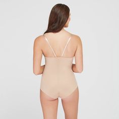 This versatile bodysuit is the ultimate solution for low-back dresses! The flawless-finish fabric is lightweight, cling-free, and offers 360 degrees of comfortable, single-layer shaping for a sleek, all-over feel. And, best of all? The innovative design features lightly padded, fit-flexible wireless cups and adjustable, convertible straps for a variety of styling options Bodysuit Shapewear, Low Back Dresses, Short Torso, Shapewear Bodysuit, Long Torso, Body Sculpting, Body Suit, Low Back, Shapewear