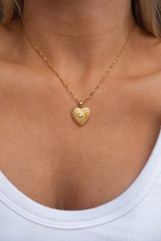 Gold Plated Heart Charm Necklace Length of Necklace: approx. 16 - 18 inches (adjustable) Gold plated Stainless Steel Heart Pendant Locket Necklace With Adjustable Chain, Adjustable Heart Shaped Clavicle Chain Necklaces, Adjustable Heart-shaped Tarnish-resistant Jewelry, Adjustable Heart Pendant Locket Necklace, Adjustable Open Heart Necklace With Adjustable Chain, Adjustable Open Heart Necklace, Adjustable Heart-shaped Locket Jewelry, Adjustable Heart-shaped Locket, Adjustable Locket Necklace For Valentine's Day