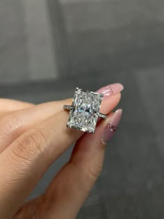 ✦ Main Stone Details✧ Shape: Radiant Cut Moissanite✧ Weight: 8.0 CT 9.0 CT 10.0 CT ✧ Color: DEF(Colorless)✧ Clarity: VVS ✦ Side Stone Details✧ Shape: Round Brilliant Moissanite✧ Weight: 0.20 CT (App.)✧ Color: DEF (Colorless)✧ Clarity: VVS ✦ Ring Details✧ Band Width: 1.50 mm (± 0.10) [Customized Possible]✧ Metal: Gold (10KT, 14KT, 18KT)✧ Metal Tone: Yellow, White, Rose Aesthetic Diamond Ring, Diamond Engagement Rings For Women, 10 Carat Engagement Ring, Wedding Rings Radiant Cut, 6 Carat Engagement Ring, 2 Carat Engagement Rings, Square Cut Engagement Ring, Square Cut Engagement Rings, Lab Created Engagement Rings