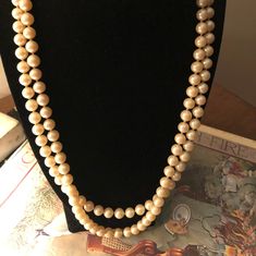 I am offering a double strand glass pearl necklace. This 1950s necklace has a nice weight. The closure is an oval set with mother of pearl. Vintage Double Strand Pearl Necklace, Vintage Multi-strand Pearl Necklace For Formal Occasions, 1950s Necklace, Applique Pillows, Stick Pins, Seed Pearl, Vintage Turquoise, Pink Cotton, Chain Styles