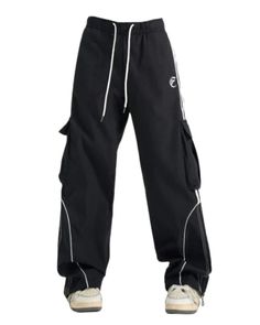 Sporty Straight Leg Parachute Pants, Sporty Straight Parachute Pants With Side Pockets, Sporty Parachute Trousers With Hip Pockets, Sporty Straight Leg Parachute Pants With Hip Pockets, Sporty Cargo Pants With Drawstring, Sporty Straight-leg Pants With Drawstring, Sporty Cotton Cargo Pants With Drawstring, Sporty Cotton Cargo Pants With Functional Drawstring, Sporty Cotton Straight Cargo Pants