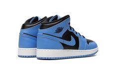 The Air Jordan 1 Mid GS "University Blue/Black" is the youth sizing of the colorway of the popular shoe with a mostly two-tone look.  The “University Blue” theme is loosely inspired by Michael Jordan’s alma mater, the University of North Carolina, as the light blue hue nods to the primary color found on the jerseys of the school’s athletic teams.  As for the design, the colorway features a black leather construction with University Blue leather overlays and Swoosh branding on the sides.  A “Wing Popular Shoe, Air Jordan 1 Mid Gs, School S, Blue Theme, Wings Logo, University Of North Carolina, Popular Shoes, Stadium Goods, Kids Jordans