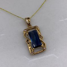 Discover the timeless elegance of our Vintage 18K Dark Blue Sapphire Pendant Necklace, designed to elevate any ensemble. These exquisite pieces blend classic sophistication with vintage charm, perfect for the discerning individual. Each necklace features a meticulously crafted pendant, available in 9K, 14K, or 18K solid gold, white gold, or rose gold, offering a radiant, opulent finish.  The centerpiece, a stunning dark blue sapphire, is expertly cut to highlight its natural brilliance and deep, Vintage Sapphire Necklace, Luxury Sapphire Necklace Hallmarked, Fine Jewelry Necklaces With Stone Setting For Formal Occasions, Formal Fine Jewelry Necklaces With Stone Setting, Formal Fine Jewelry Necklace With Stone Setting, Sapphire Necklace For Anniversary, Gold Jewelry With Rectangular Stone For Formal Events, Gold Jewelry With Rectangular Stone For Formal Occasions, Formal Gold Jewelry With Rectangular Stone