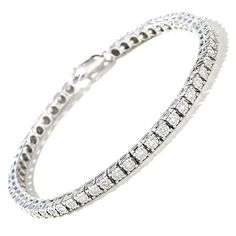 Illuminate her wrist with the lavish look of this classic 1 ct. t.w. diamond sterling silver tennis bracelet. Crafted in sterling silver Shimmering diamonds - each artfully set to enhance size and sparkle - line this classic design. Look great solo or layered with other bracelets Captivating with 1 ct. t.w. of diamonds This 7.0-inch bracelet secures with a lobster claw clasp. Exquisite Platinum Tennis Bracelet With Diamond Accents, Luxury Sterling Silver Tennis Bracelet With Diamond Accents, Elegant White Tennis Bracelet With Single Cut Diamonds, White Gold Tennis Bracelet With Diamond Accents, Platinum Tennis Bracelet With Diamond Accents, Silver Brilliant Cut Diamond Bracelet In Platinum, Elegant White Sterling Silver Bracelet With Prong Setting, Platinum Tennis Bracelet For Everyday Luxury, Silver Platinum Diamond Bracelet With Brilliant Cut