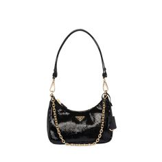 Prada pouch shoulder bag in sequin nylon and leather  Signature triangle logo accent  Detachable chain top handle  Detachable flat leather shoulder strap  Can be worn as a top handle or shoulder bag  Zip top closure  Approx. 7"H x 8.6"W x 2.4"D Made in Italy Leather Baguette Bag With Detachable Strap For Party, Evening Pouch Baguette Bag, Party Shoulder Baguette Bag With Gold-tone Hardware, Evening Baguette Bag With Zipper, Pouch Shape, Evening Baguette Bag Pouch With Zipper Closure, Pouch-shaped Evening Baguette Bag With Zipper Closure, Evening Top Handle Baguette Bag With Zipper, Evening Baguette Bag With Zipper Closure And Top Handle, Evening Baguette Bag With Top Handle And Zipper